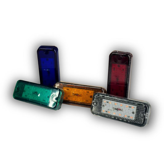 A collection of various colored body lights for vehicles.
