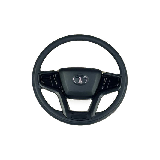 A black SIGNA steering wheel designed for Tata trucks, featuring a solid grip and control layout.