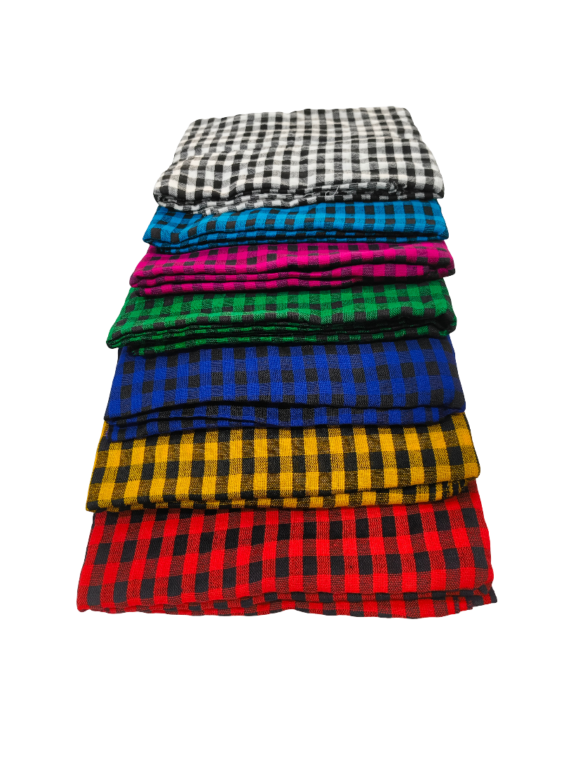 Stack of colorful checkered fabrics on a white background