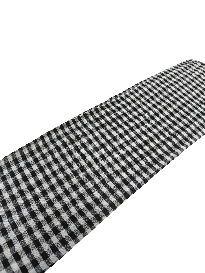 Black and white checkered fabric on a white background