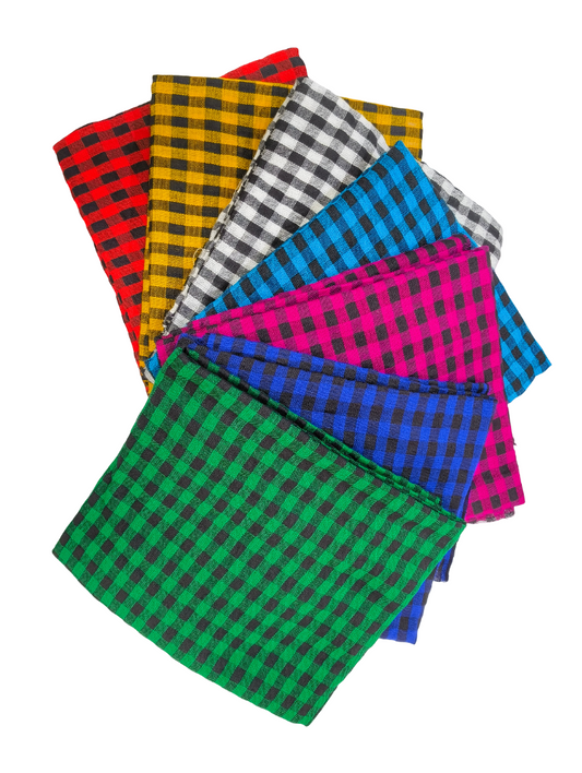 Set of colorful checkered napkins on a white background