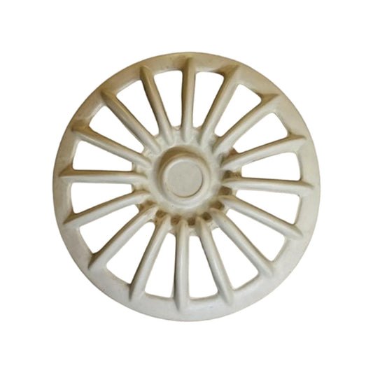 Beige plastic wheel cap on a white background