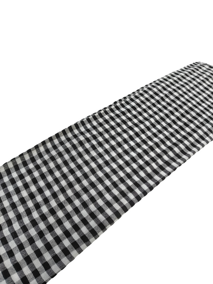 Black and white checkered fabric on a white background